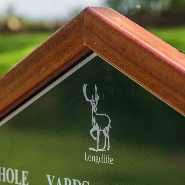 Longcliffe crest on its tee sign