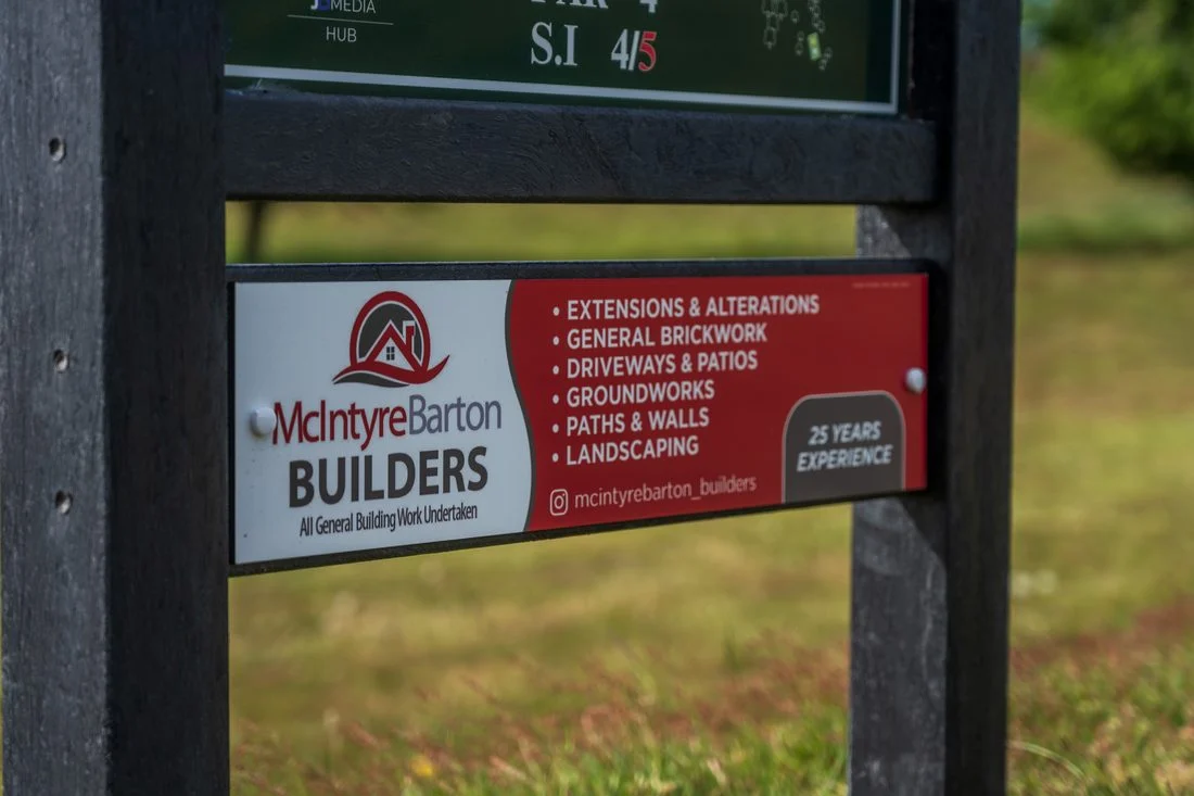 McIntyre Barton sponsor panel installed on a tee sign