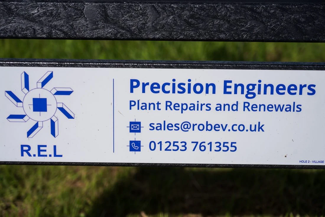 R.E.L sponsor panel installed on a tee sign