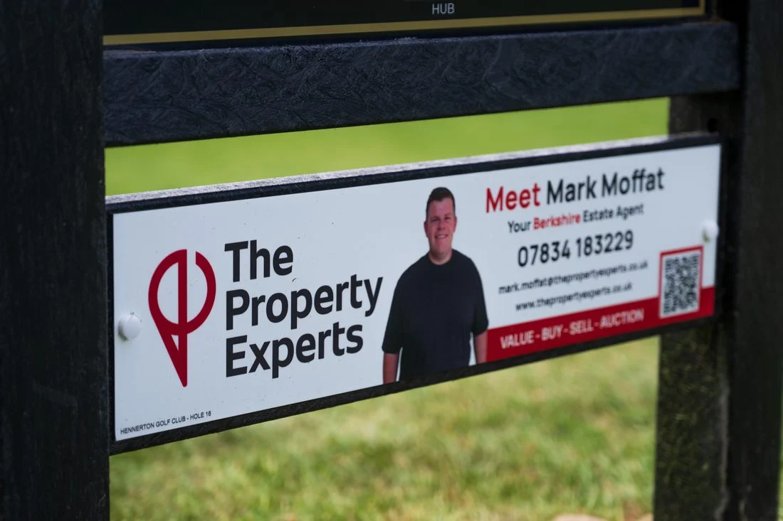 The Property Experts sponsor panel installed on a tee sign