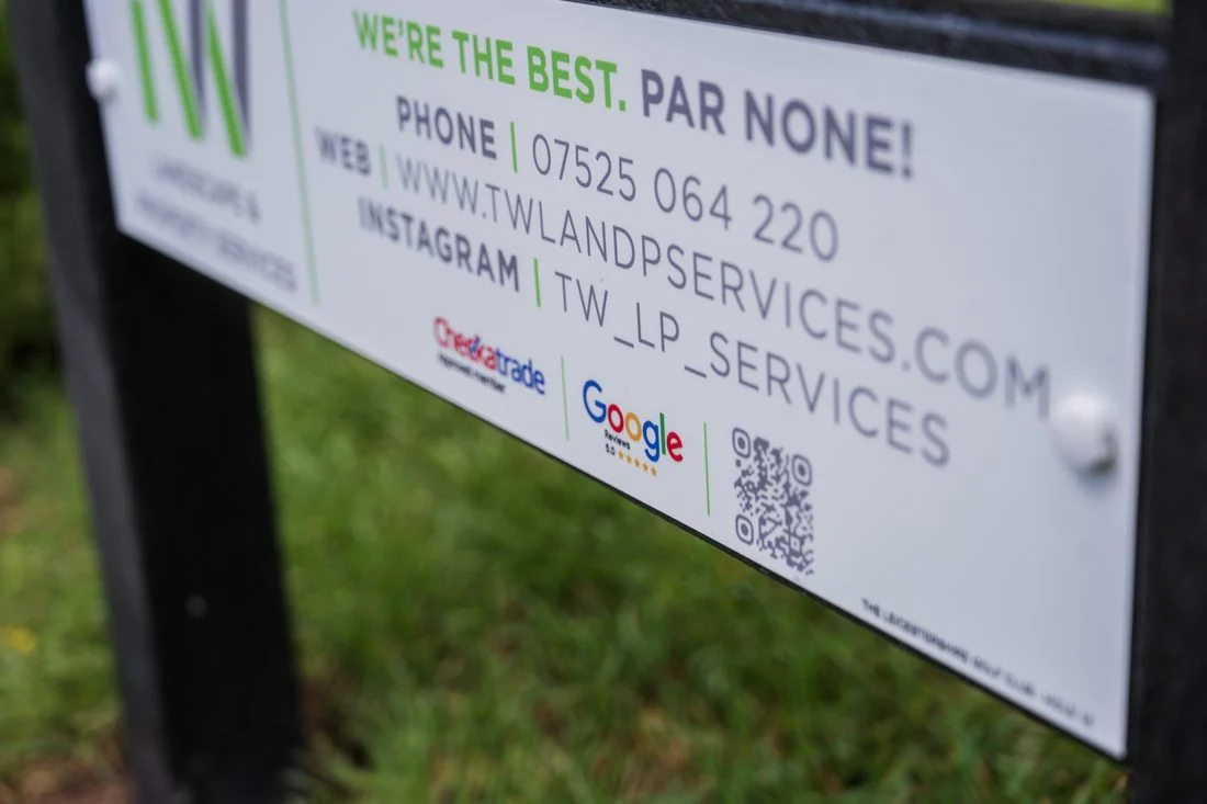 TW Landscape & Property sponsor panel installed on a tee sign