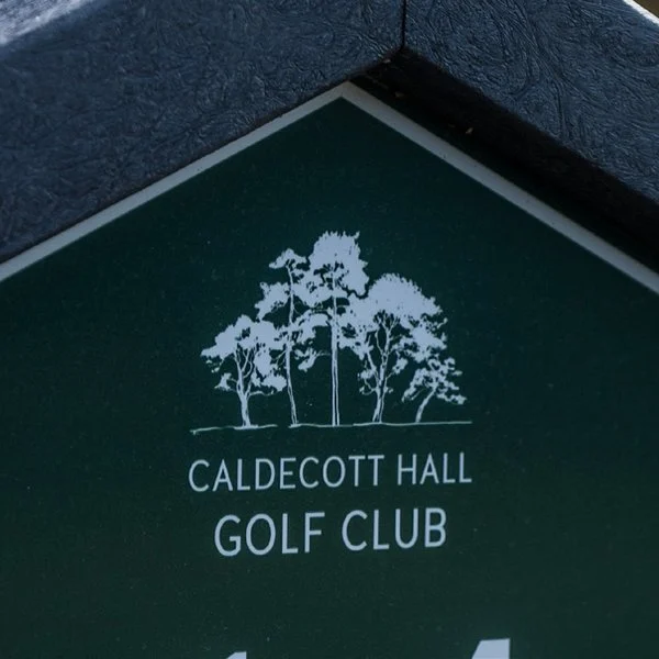 Caldecott Hall crest on its tee sign