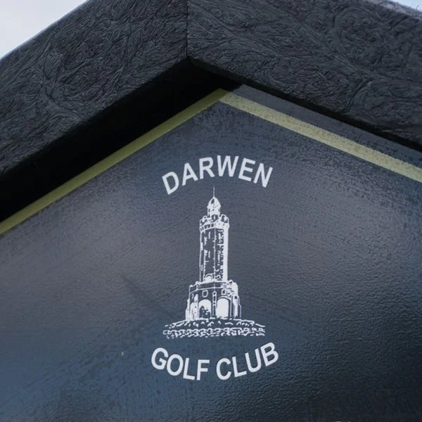 Darwen crest on its tee sign