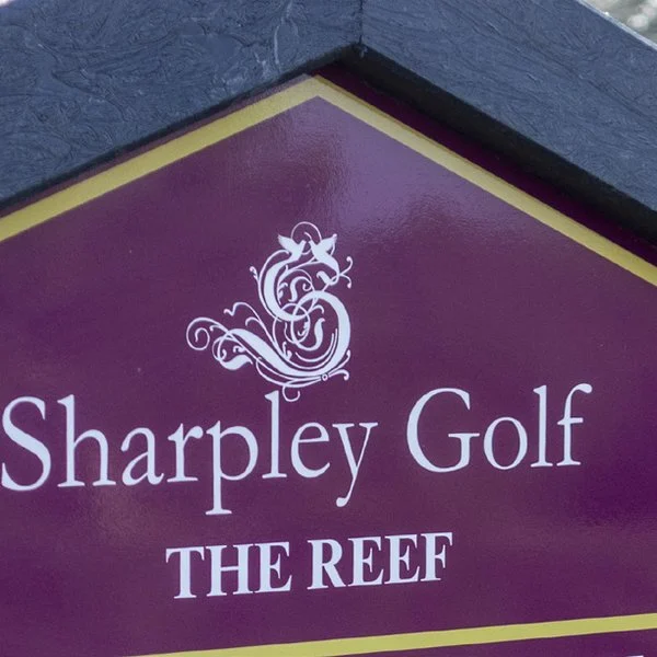 Sharpley Golf Club crest on its tee sign