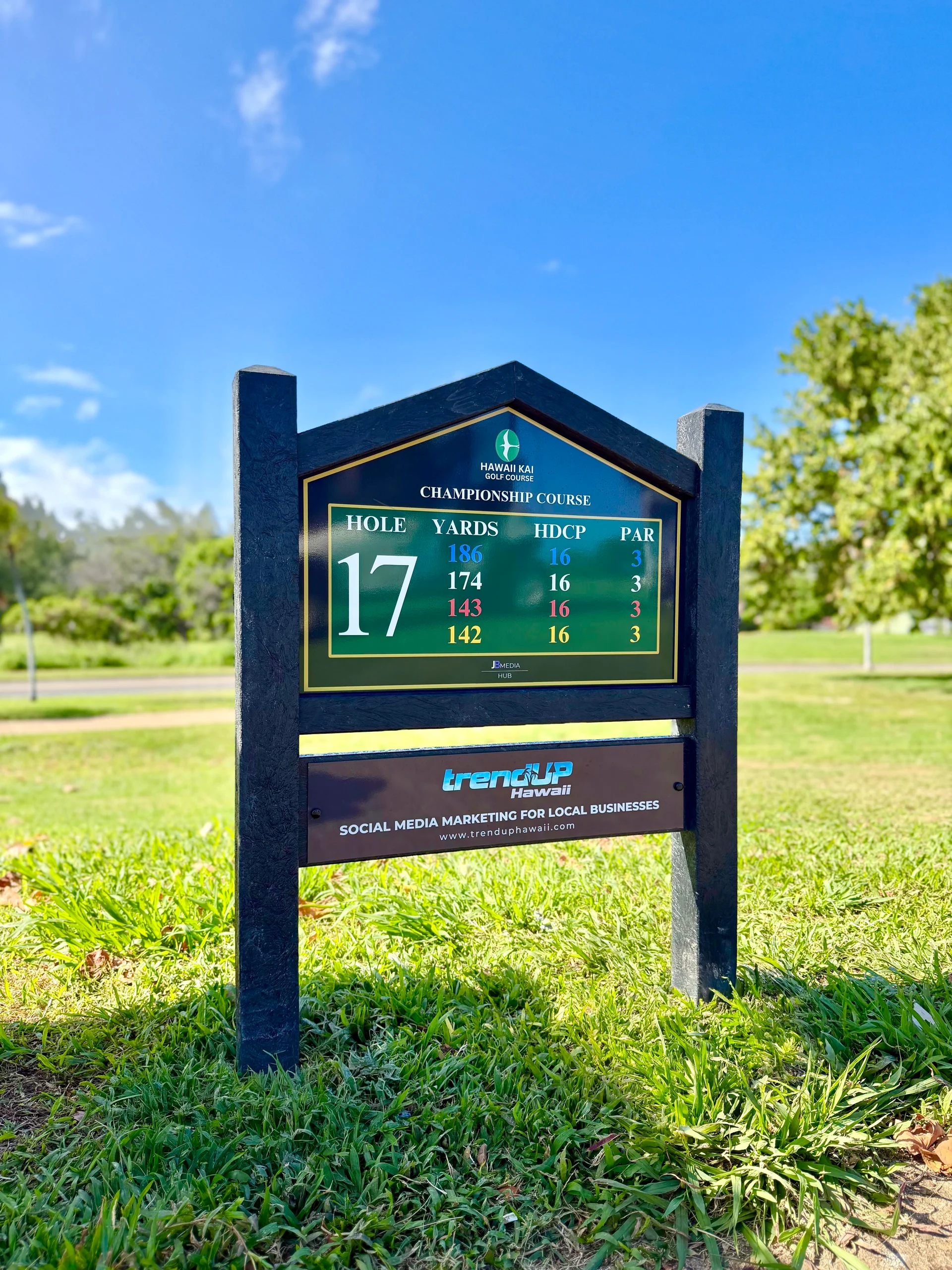 Hawaii Kai Golf Course hole 17 tee sign and TrendUP Hawaii sponsorship panel